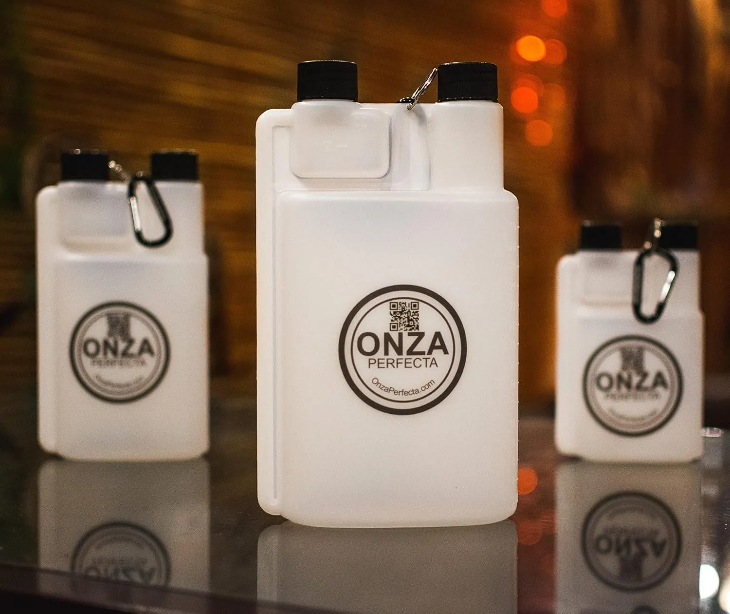 16 oz Plastic flask for liquor hidden with 1 ounce shot glass dosage chamber (16 oz / 473 ml). Included carabiner.