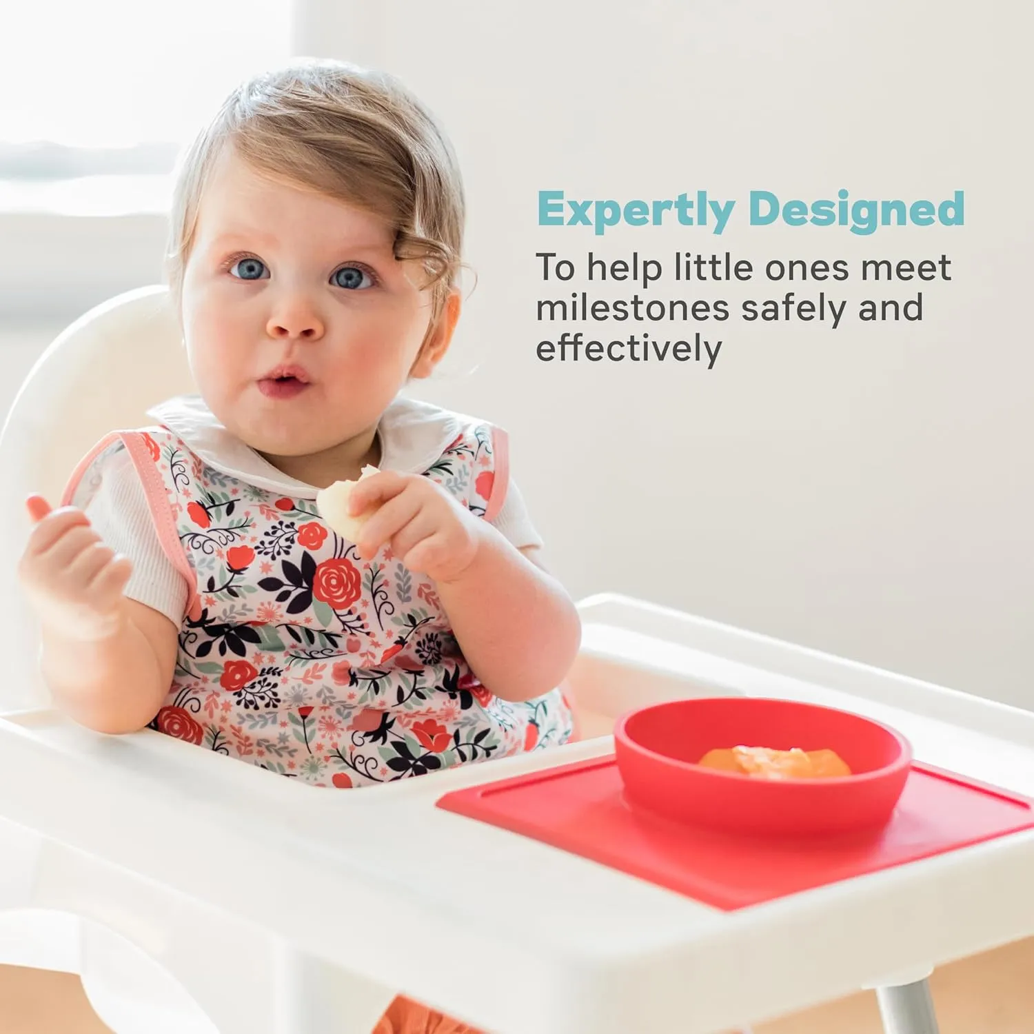 ezpz Mini Bowl for 12 Months  (Coral) - 100% Silicone Suction Bowl with Built-in Placemat for Toddlers - Comes with a Reusable Travel Bag