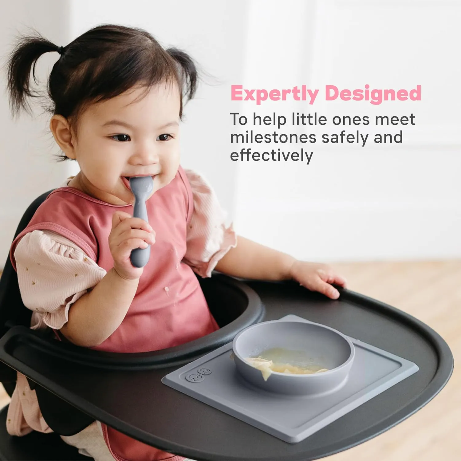 ezpz Mini Bowl for 12 Months  (Gray) - 100% Silicone Suction Bowl with Built-in Placemat for Toddlers - Comes with a Reusable Travel Bag